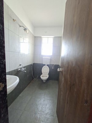 Bathroom in 2 BHK Apartment at Dhanashree Anand, Handewadi – for Rent