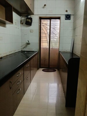 Kitchen in 2 BHK Apartment at Shiv Shrishti CHS, Powai – for Rent