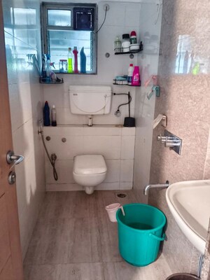Bathroom in 2.5 BHK Apartment at Kanakia Spaces Niharika, Manpada – for Sale