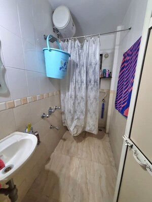 Bathroom in 2 BHK Apartment at Mansi Vihar, Malad East – for Rent