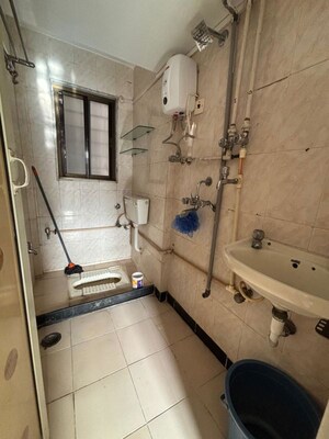 Attached Bathroom in 1 BHK Apartment at AMI Jharna, Goregaon East – for Rent