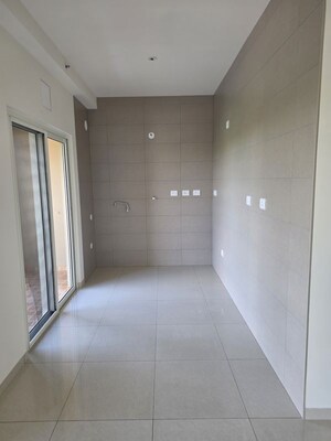 Kitchen in 2 BHK Apartment at Thanisandra Main Road – for Sale