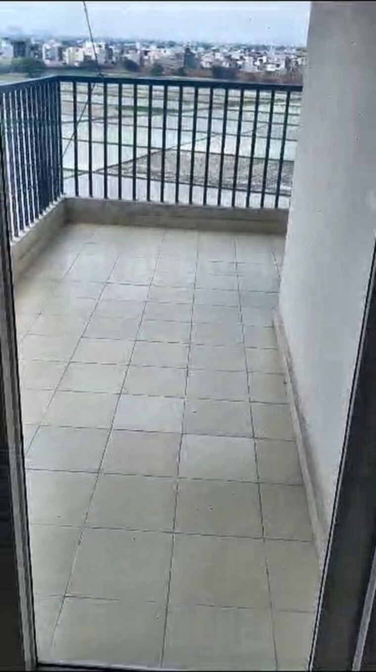 Balcony, gaur-yamuna-city-16th-park-view 2 Bedroom 1075 Sq.Ft. Apartment In Gaur Yamuna City Greater Noida 10653145