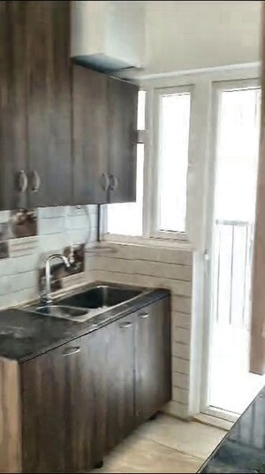 Kitchen in 2 BHK Apartment at Gaur Yamuna City 16th Park View, Gaur Yamuna City – for Sale