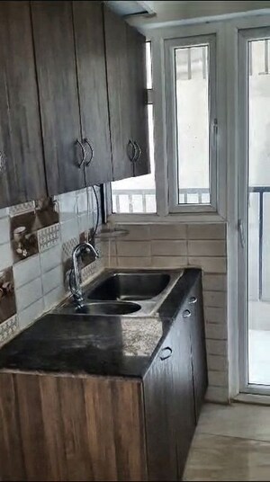 Kitchen in 2 BHK Apartment at Gaur Yamuna City 16th Park View, Gaur Yamuna City – for Sale