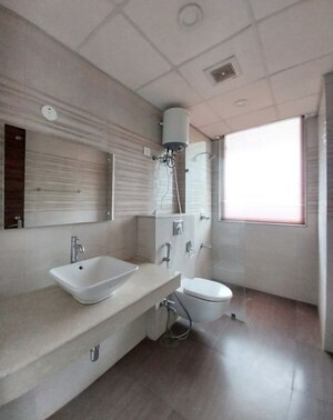 Bathroom in 4 BHK Apartment at Krrish Provence Estate, Gurgaon Faridabad Road – for Rent