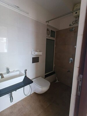 Bathroom in 1 BHK Apartment at Omkar Signet, Malad East – for Rent