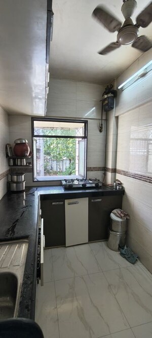 Kitchen in 1 BHK Apartment at Shree Vijapur CHS, Kandivali East – for Rent