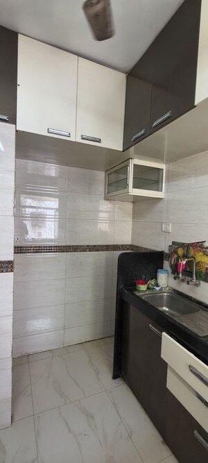 Kitchen in 1 BHK Apartment at Shree Vijapur CHS, Kandivali East – for Rent