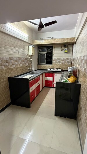 Kitchen in 2 BHK Apartment at Kanchan Apartment 39, Vasant Vihar – for Rent