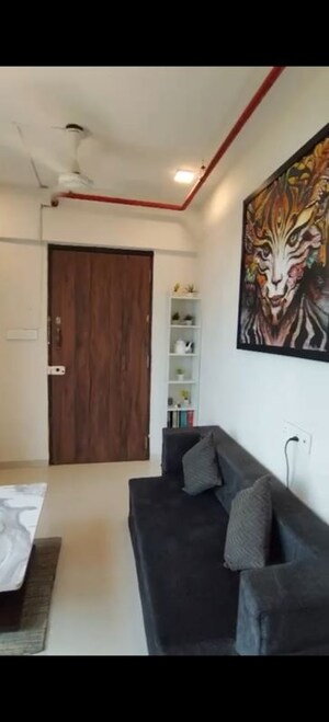 Living Room in 1 BHK Apartment at Versova Heights, Versova – for Rent