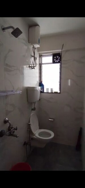 Bathroom in 1 BHK Apartment at Versova Heights, Versova – for Rent