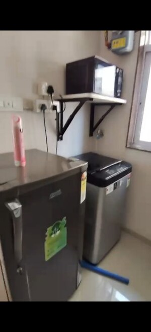 Team Area in 1 BHK Apartment at Versova Heights, Versova – for Rent