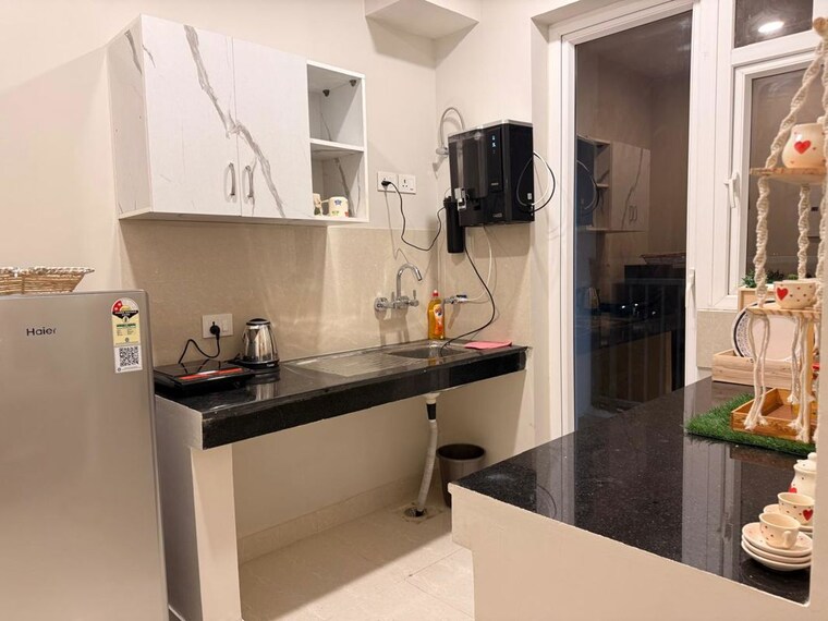 Kitchen, eldeco-live-by-the-greens 2 Bedroom 1137 Sq.Ft. Apartment In Sector 150 Noida 10687927