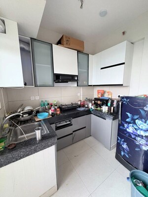 Kitchen in 2 BHK Apartment at Tata Eureka Park, Sector 150 – for Rent