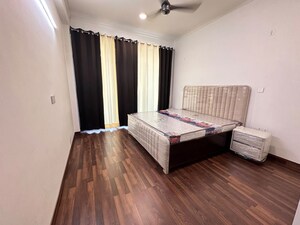 Bedroom in 3 BHK Builder Floor at Ansal Esencia-Mulberry Homes, Sector 67 – for Rent