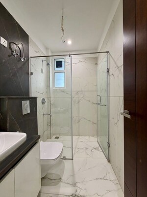 Bathroom in 4 BHK Apartment at Dhakoli – for Sale