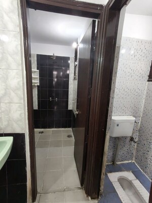 Bathroom in 2 BHK Apartment at RWA Apartments Sector 51, Sector 51 – for Rent