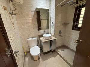 Bathroom in 3 BHK Builder Floor at East Of Kailash – for Sale