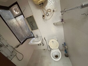 Bathroom in 3 BHK Builder Floor at East Of Kailash – for Sale