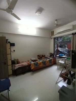 Living Room in 1 BHK Apartment at Goregaon West – for Sale