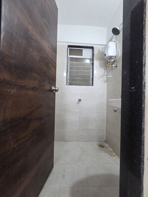 Bathroom in 1 BHK Apartment at DGS Sheetal Tapovan, Malad East – for Rent