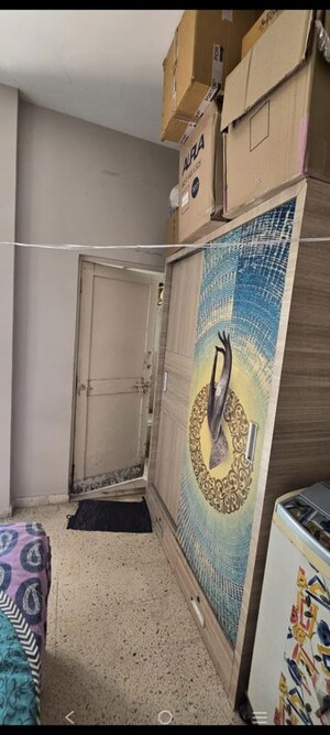 Building Lobby in 2 BHK Apartment at Krishna Tower Ahmedabad, Satellite – for Rent