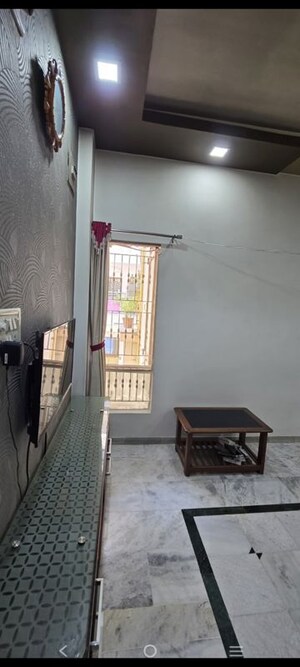 Living Room in 2 BHK Apartment at Krishna Tower Ahmedabad, Satellite – for Rent