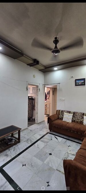 Living Room in 2 BHK Apartment at Krishna Tower Ahmedabad, Satellite – for Rent