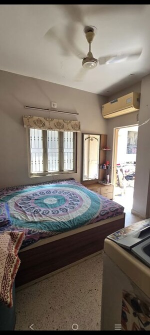 Bedroom in 2 BHK Apartment at Krishna Tower Ahmedabad, Satellite – for Rent