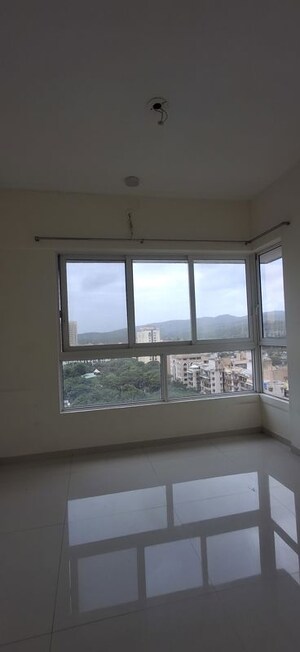 Room in 2 BHK Apartment at Wadhwa TW Gardens, Kandivali East – for Rent