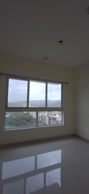 Room in 2 BHK Apartment at Wadhwa TW Gardens, Kandivali East – for Rent
