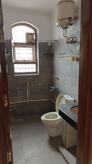 Bathroom in 3 BHK Builder Floor at Chattarpur – for Rent