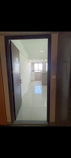 Building Lobby in 1.5 BHK Apartment at Sun Rising Homes, Jagatpur – for Rent
