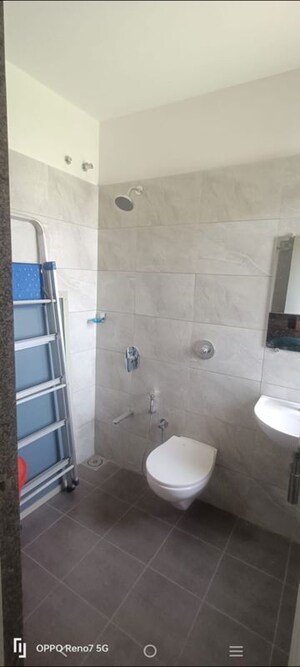 Bathroom in 3 BHK Apartment at Goyal Orchid Valley, Shela – for Rent