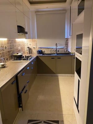 Kitchen in 3 BHK Apartment at Ansal Crown Heights, Sector 80 – for Rent