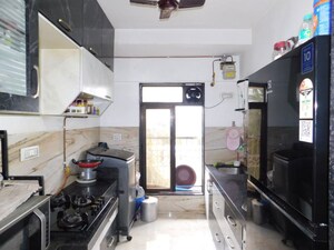 Kitchen in 2.5 BHK Apartment at Geeta Bhavan Andheri, Andheri East – for Sale