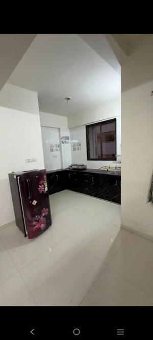 Kitchen in 2 BHK Apartment at Sangani Samarthya Residency, Chandkheda – for Rent