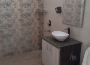 Bathroom in 2 BHK Apartment at Varun Enclave, Sector 28 – for Rent