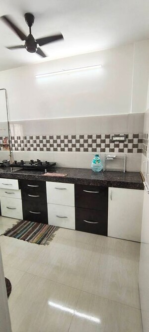 Kitchen in 1 BHK Apartment at Dheeraj Uphar CHS. LTD., Malad East – for Rent