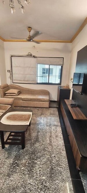 Living Room in 1 BHK Apartment at Dheeraj Uphar CHS. LTD., Malad East – for Rent