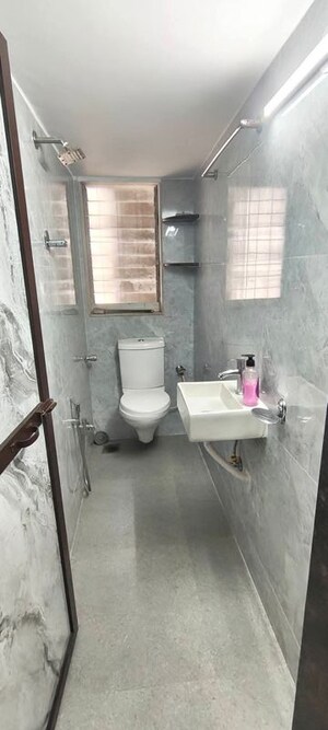 Bathroom in 1 BHK Apartment at Dheeraj Uphar CHS. LTD., Malad East – for Rent