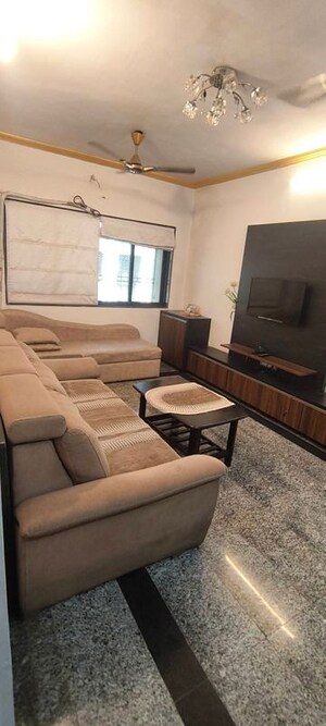 Living Room in 1 BHK Apartment at Dheeraj Uphar CHS. LTD., Malad East – for Rent