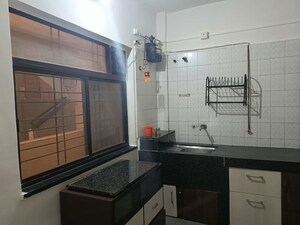 Kitchen in 2 BHK Apartment at Mantri Park I and II, Kothrud – for Rent