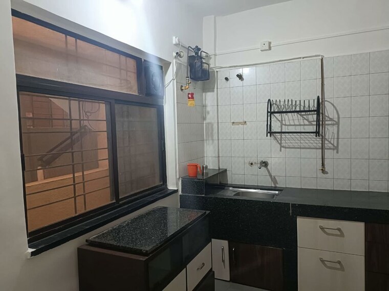 Kitchen, mantri-park-i-and-ii 2 Bedroom 800 Sq.Ft. Apartment In Kothrud Pune 10688555