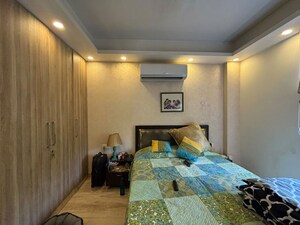 Bedroom in 3 BHK Builder Floor at Kailash Colony – for Sale