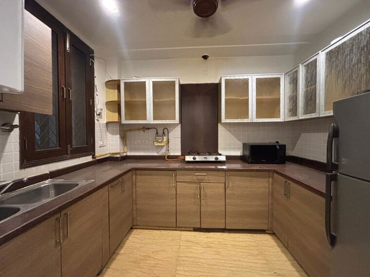 Kitchen, kailash colony 3 Bedroom 160 Sq.Yd. Builder Floor In Kailash Colony Delhi 10688554