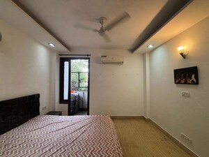 Bedroom in 3 BHK Builder Floor at Kailash Colony – for Sale