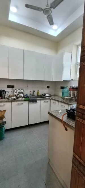 Kitchen in 3 BHK Builder Floor at Kailash Colony – for Sale