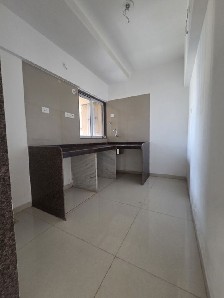 Kitchen, avant-hillway 2 Bedroom 756 Sq.Ft. Apartment In Goregaon East Mumbai 10688546